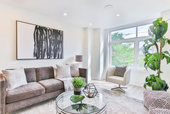 A contemporary white and gray living room