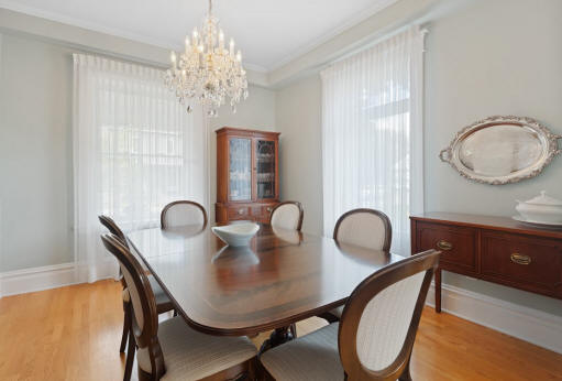 Simple classic dining room with crystal chandelier