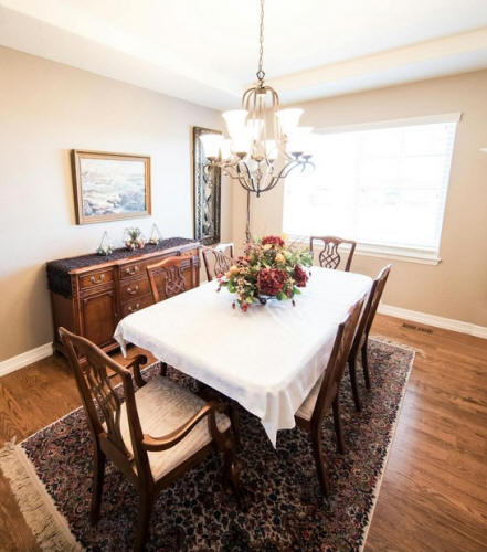 Formal dining room with Chippendale chairs and chandelier